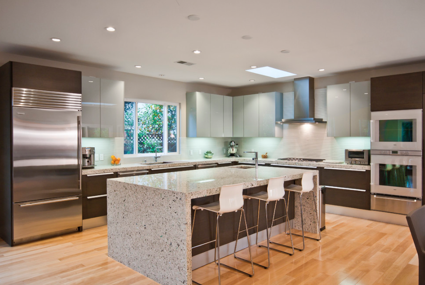 gray kitchen with yellow cabinets