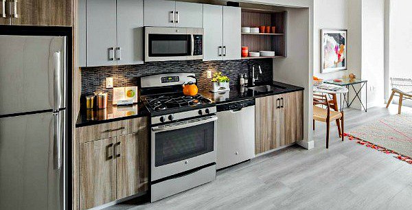 dark grey kitchen cabinets yellow walls