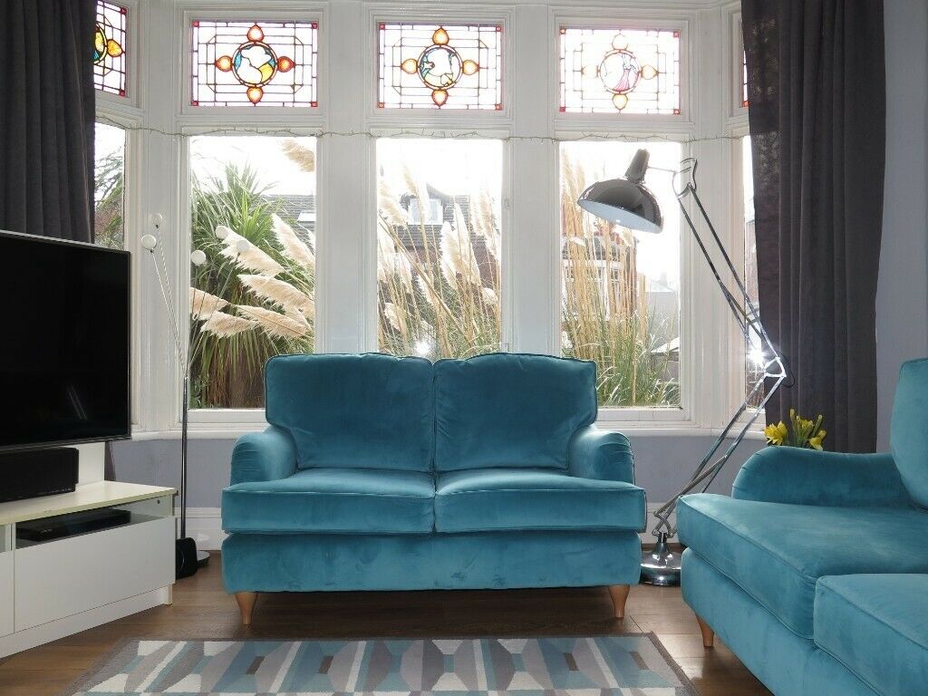 teal Howard sofas for utmost comfort