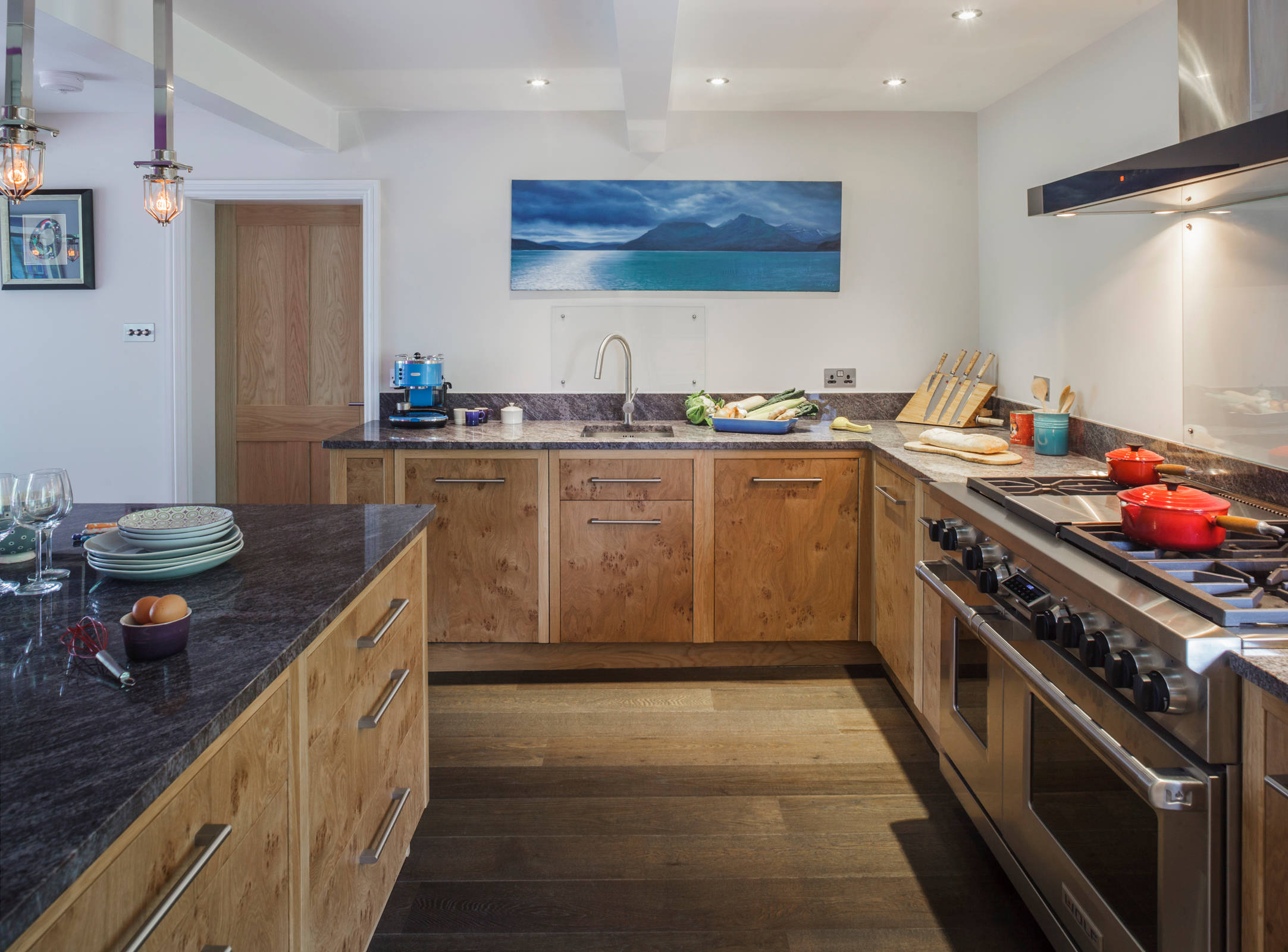 kitchen cabinets with raw wood finishes