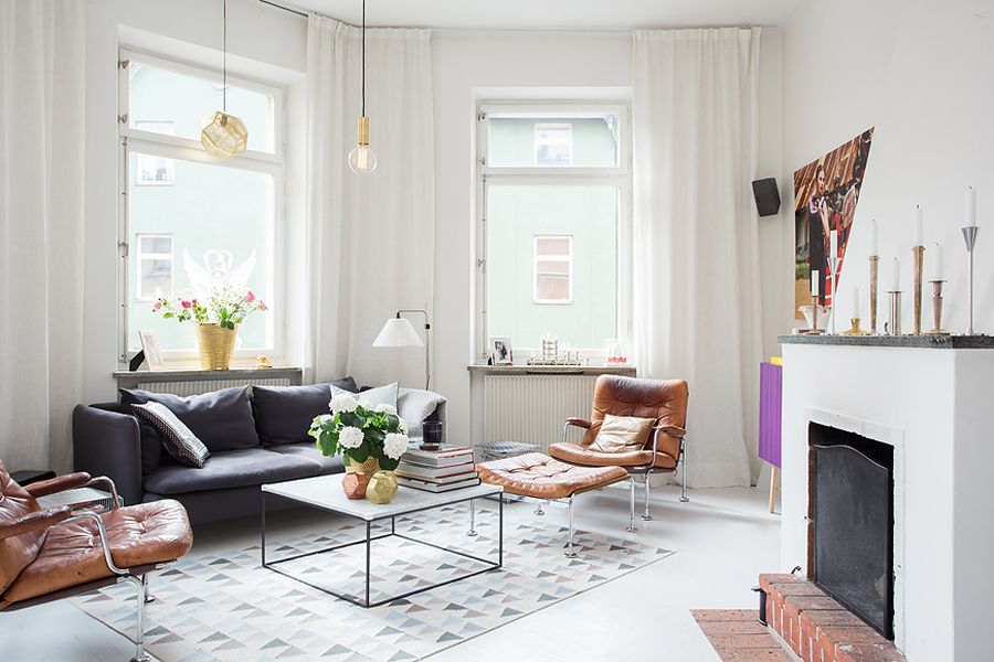 living room with plastered fireplace