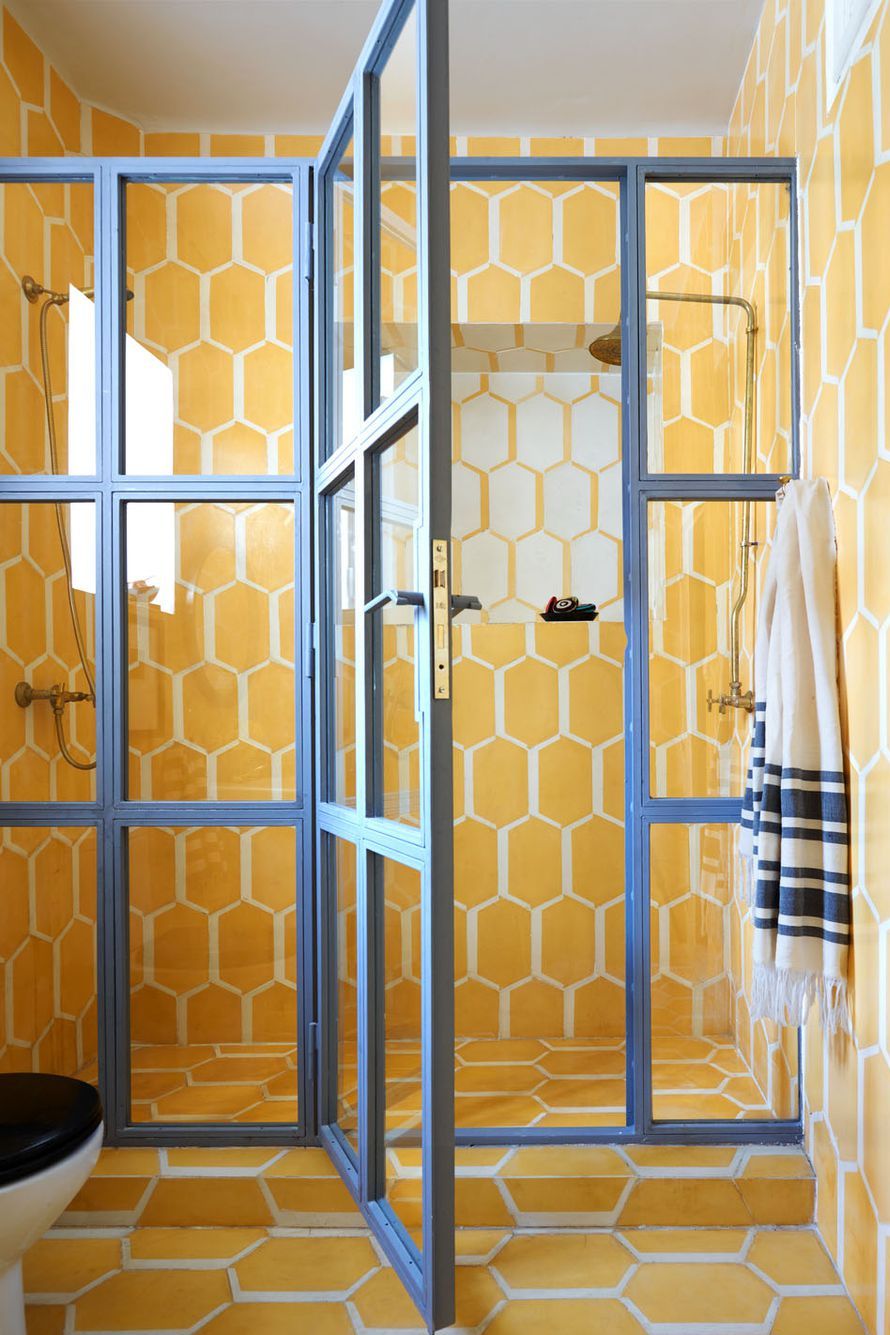 Bathroom with Blue-Framed Door