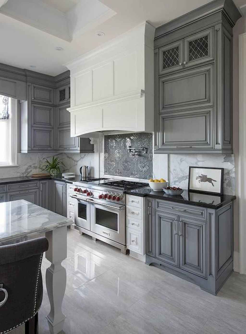 kitchen with dark cabinets and light floors