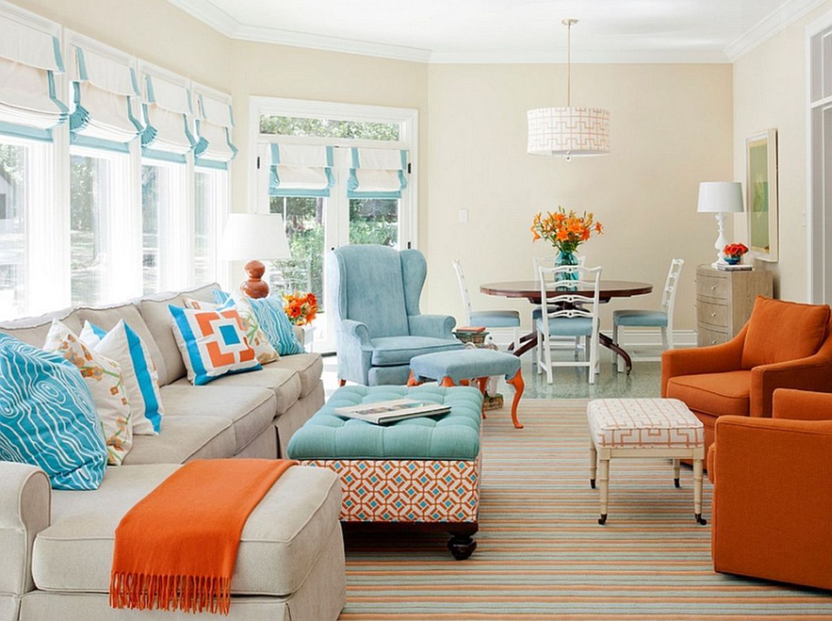 living room with orange chairs